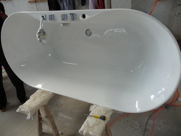 freestanding tub with faucets installed