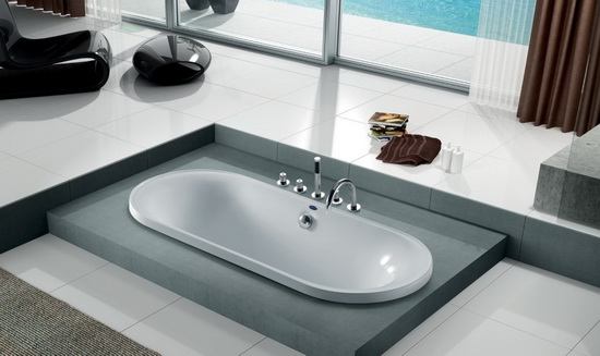 Oval deep soaking soft tub in bathroom